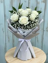 Букет цветов из:  Розы в Северном Московской области